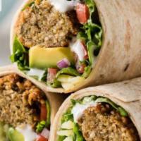 The Middle Eastern Wrap · Hummus,falafel, tomato,red onions,parsley,baby spinach,jalepeno. Choose your dressing.  Free...