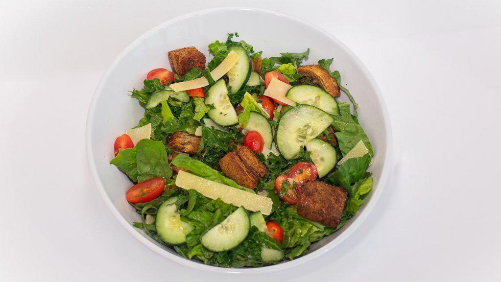 Kale Caesar Salad · Romaine, kale, grape tomatoes, cucumbers, Lilli’s Croutons, Parmesan Cheese, eggless Caesar Dressing