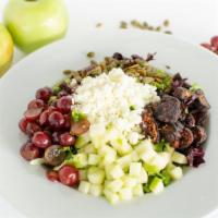 Harvest Salad · Fresh spring mix and baby arugula, apples, seasonal fruits, sliced figs, pumpkin seeds, goat...
