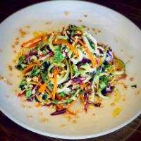 Thai Chicken Salad · Cabbage, red bell pepper, celery, carrots, cilantro, peanuts, roasted sesame vinaigrette.