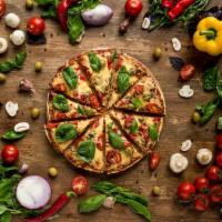 BYO Pizza · Build your own pizza. Comes with choice of crust. Add sauce, vegan cheese or toppings for an...