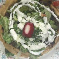 Regulares Sopes Caseros · Served with beans, sour cream, fresh cheese, onion and cilantro. Tortilla hecha a mano.