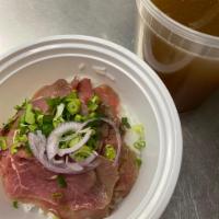 PH2. Pho with Raw Beef · Served with flat rice noodle, onion, scallion, cilantro in beef broth.