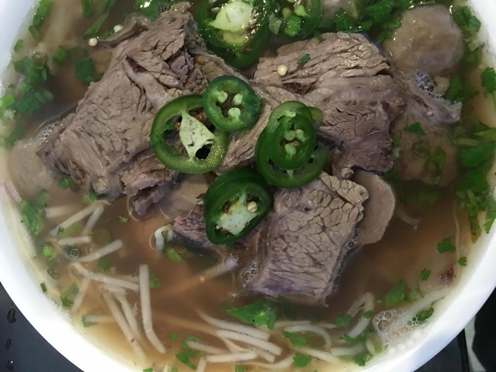 PH3. Pho with Brisket · Served with flat rice noodle, onion, scallion, cilantro in beef broth.