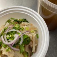 PH4. Pho with Tendons · Served with flat rice noodle, onion, scallion, cilantro in beef broth.