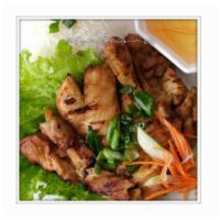 C5. Grilled Chicken · Marinated with garlic lemongrass herbs over rice.