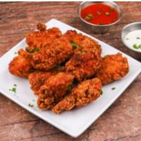 Boneless WIngs · Cooked wing of a chicken coated in sauce or seasoning.