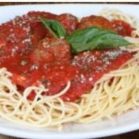 Spaghetti with Fresh Tomato Sauce · Long thing pasta.