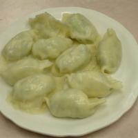 6. Napa Cabbage and Pork Dumpling 大白菜餃 (10 pieces)  · Stuffed dough. 