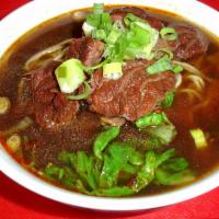 1. Chef's Special Beef Handmade Noodle in Spicy Soup 招牌牛肉湯麵 · Spicy.辣