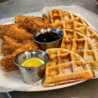 Chicken & Waffles · 5 seasoned, deep-fried, golden, battered chicken wings with sweet buttered waffles drizzled ...
