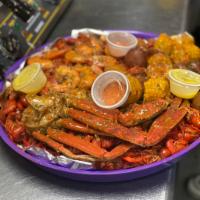 Shrimp & Snow Crab Combo · 10 jumbo shrimp, 1 lb. of snow crab, 2 corns and 2 potatoes. Spicy or mild. Add Cajun rice f...