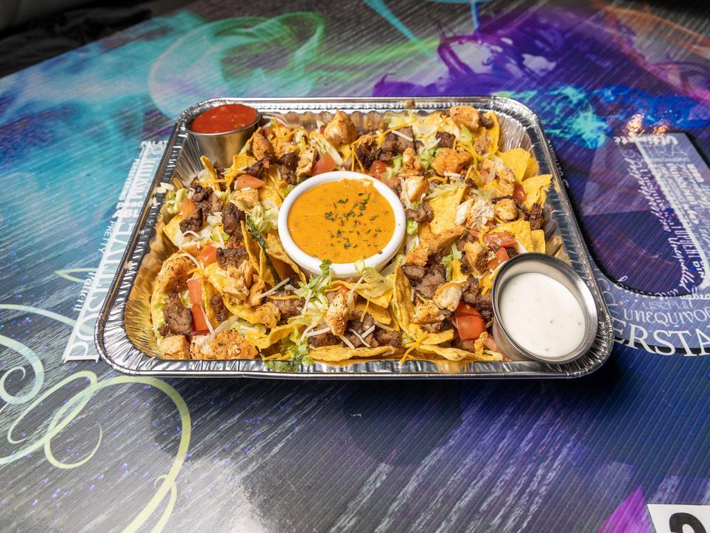 Big Dumb Nachos · Loaded with grilled fajita chicken, beef, shrimp, and cheese with a side of lettuce, jalapenos, sour cream and pico de gallo.