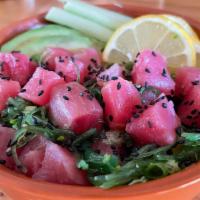 Tuna Poke · Tuna, avocado, cucumber, lemon, seaweed salad with green onion.