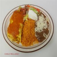 Chile Relleno · Fried and stuffed poblano peppers with ground beef and cheese, or just cheese. Garnished wit...