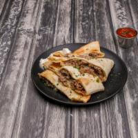 Steak Quesadilla · Includes onions and green peppers. Sour cream and salsa on the side.