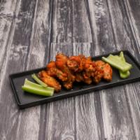 10 Piece Buffalo Style Chicken Wings · Served bleu cheese dressing.