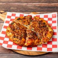 14. Quattro Staggioni Pizza · Prosciutto, mushrooms, fresh basil, Parmesan, and mozzarella cheese.