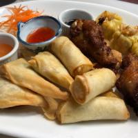 Assorted Thai Appetizers Combo · A variety selection of Thai appetizers including steamed dumplings, chicken wings, spring ro...