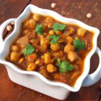 Chole · Chickpea curry made with tomato, onion, Thai chilies, garlic, cashew and Indian spices. Vega...