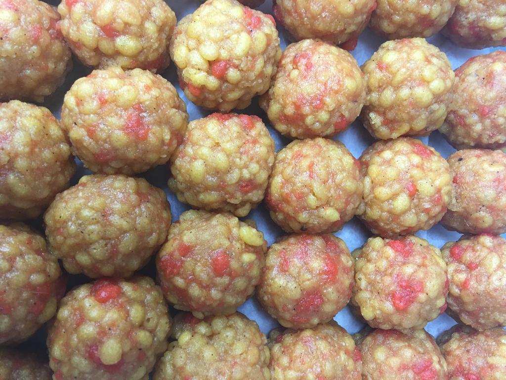 Boondi Laddu · Soft gram flour pearls, fried in light soybean oil, with cardamom, nutmeg, sugar syrup and shaped into balls. Vegan. Gluten-free. (6 pieces)