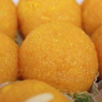 Motichoor Laddu · Soft gram flour pearls, fried in light soybean oil, are ground and blended with cardamom, nu...