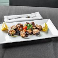 Fresh Grilled Octopus · Char grilled and drizzled with extra virgin olive oil, fresh lemon juice, and parsley.