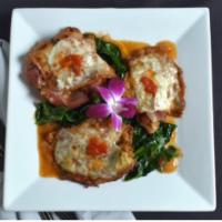 Chicken Sorrentino · Pounded thin, topped with prosciutto, eggplant mozzarella, light brown sauce. Served with sa...
