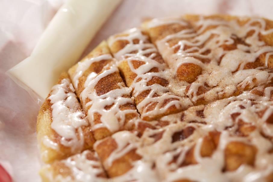 Sin Stix · Strips of fresh baked dough covered with butter, smothered with cinnamon, sugar and loaded with creamy white icing.