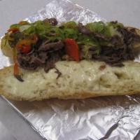 Steak Sub · Tender shaved ribeye steak on a toasted roll with mozzarella with choice of sauce.