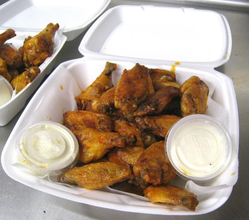 Jumbo Chicken Wings · 10 wings. Oven roasted jumbo wings with choice of flavor.