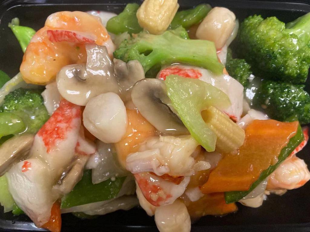 A12. Seafood Delight · Lobster meat, jumbo shrimp, scallops and crab meat sauteed with assorted mixed vegetables in a special white sauce.