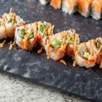 Tiger Roll · Shrimp, jalapeno, avocado, massago, topped with spicy mayo and eel sauce.
