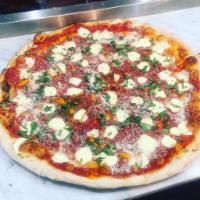 Magharita Pizza · 100% Fresh mozzarella, Basil, Parmesan Cheese, and Extra Virgin Olive Oil.