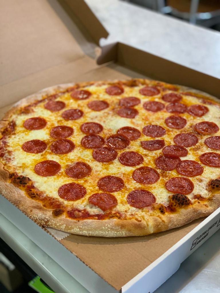 Pepperoni Pizza · Pepperoni, 100% real Mozzarella Cheese.