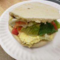 Egg Salad Pita Sandwich · A cold creamy sandwich made with chopped eggs, mayo, and seasoning. 