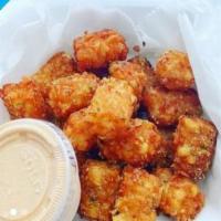 Tater Tots · Made to order tater tots. Top them with bacon and cheese for a real treat. Served with bomb ...
