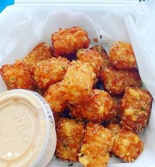 Tater Tots · Made to order tater tots. Top them with bacon and cheese for a real treat. Served with bomb sauce. Add bacon and cheese for an additional charge.