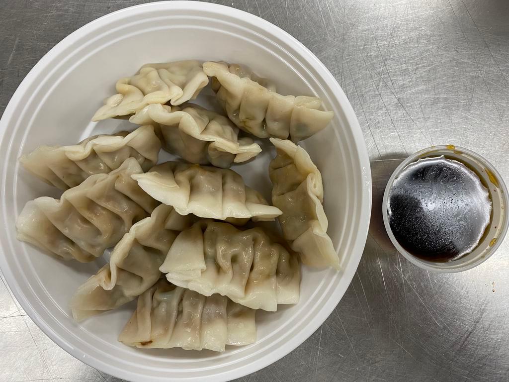 Steam Dumplings (10)水饺 · 10 pieces.