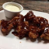Chicken Wings · Served with blue cheese dressing.