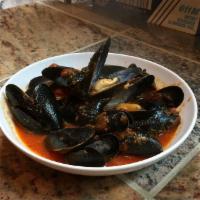 PEI Mussels · Steamed with roasted garlic, fresh basil, white wine  or  in our marinara sauce.