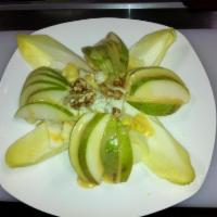 Pear Salad · Pears, endive, toasted walnuts and imported Danish blue cheese with a champagne vinaigrette.