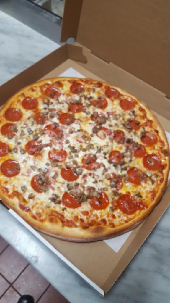 Meat Lovers Pizza · Sausage, ham meatball and pepperoni.