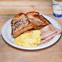 3. French Toast Breakfast · 2 eggs any style, bacon, sausage or ham, regular coffee and tea or juice.