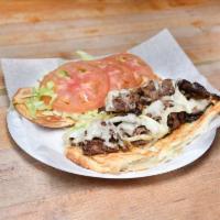 19. Steak Sandwich · Served with lettuce and tomatoes.