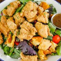 Chicken ＆ Waffle Salad · Mix greens, cherry tomatoes, dried cranberries, spiced pecans, goat cheese, and waffle crout...