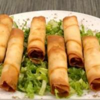 Turkish Cigar Rolls  · 4 pieces. Sigara boregi. Cigar shaped pastry, stuffed with cheese and parsley. 
