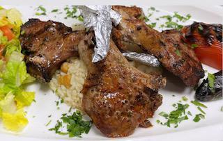 Baby Lamb Chops  ·  Char-grilled baby lamb chops served with house salad and rice 