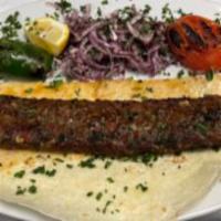 Adana Lamb Kebab  ·  Skewered and grilled ground lamb and flavored with red bell peppers lightly seasoned with p...