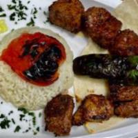 Lamb Shish Kebab  ·  Marinated lean cubes of lamb on a skewer with peppers and onions. 